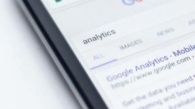 Image of a phone showing a Google search for the keyword 'analytics'